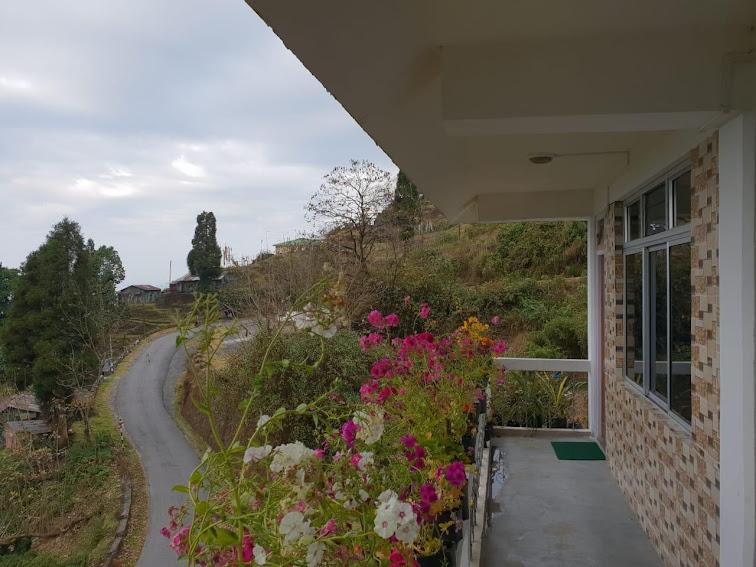 Balcony overlooking the hill road at Phadamchen