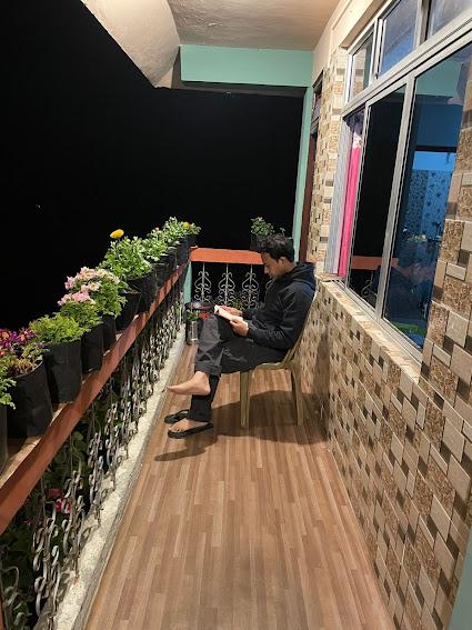 Common balcony shared by the rooms