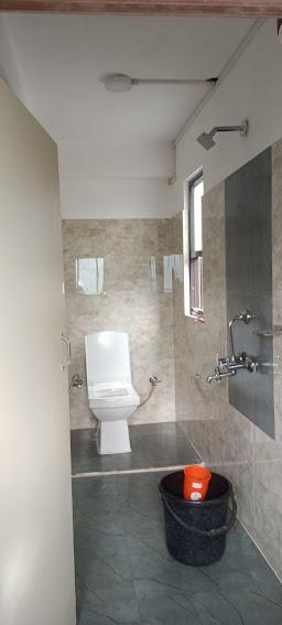 Attached washroom with modern fittings