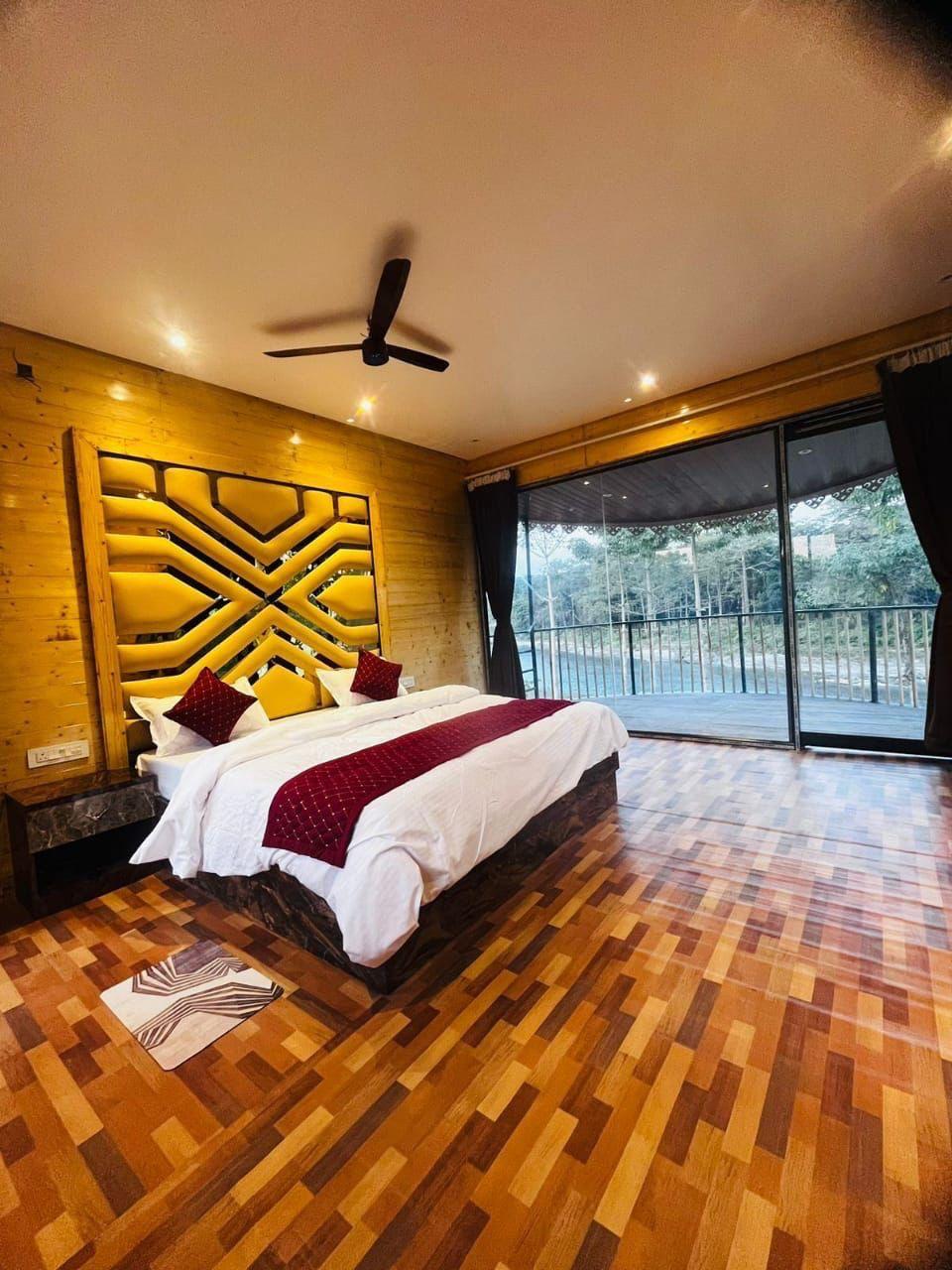 Tong House bedroom with a king bed