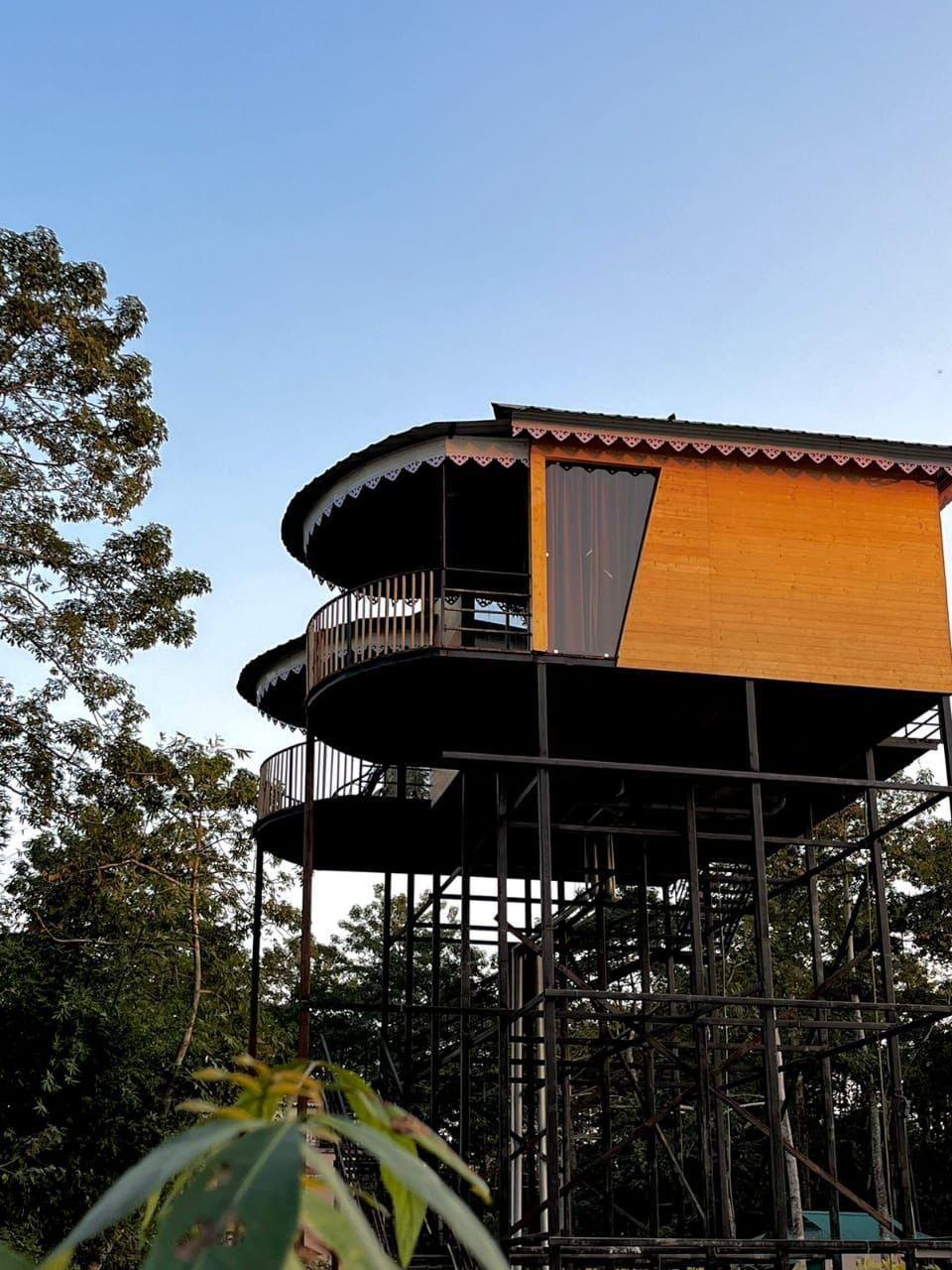 The elevated Tong House built in traditional Dooars style