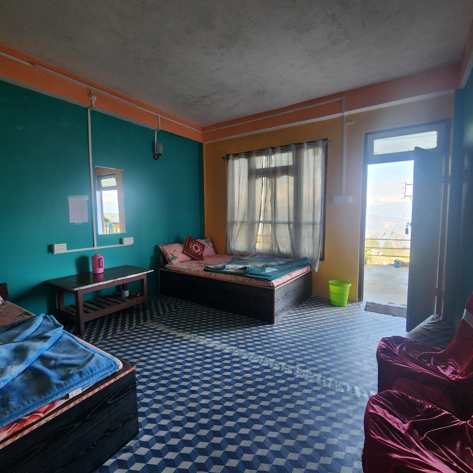 Kanchenjunga View Homestay Room with 2 wooden beds