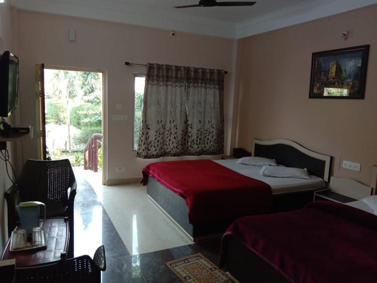Deluxe four-bed room with two queen beds